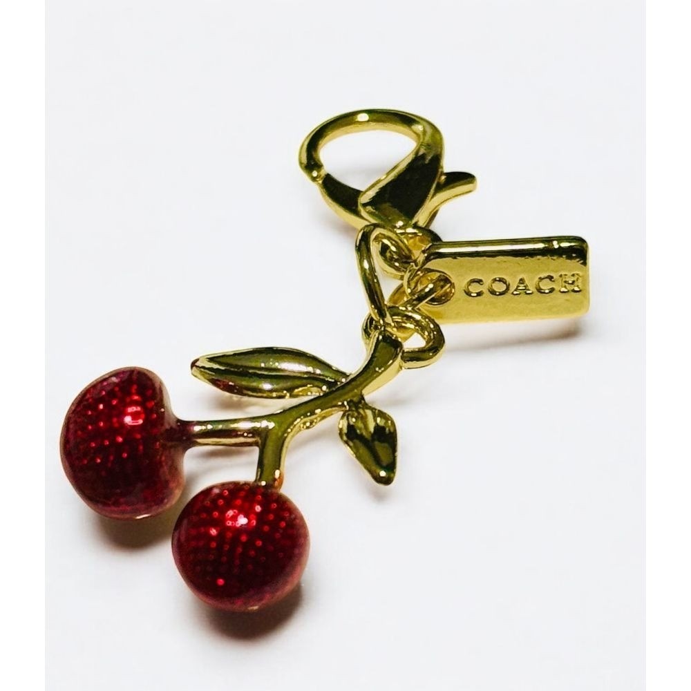 Coach Gold-Tone Cherry Keychain with Red Enamel Accents | Designer Bag Charm